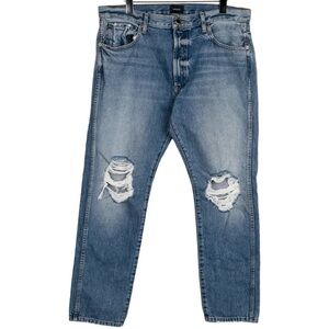 KHAITE Kyle Low-Rise Straight Jeans Distressed Denim Blue Jeans